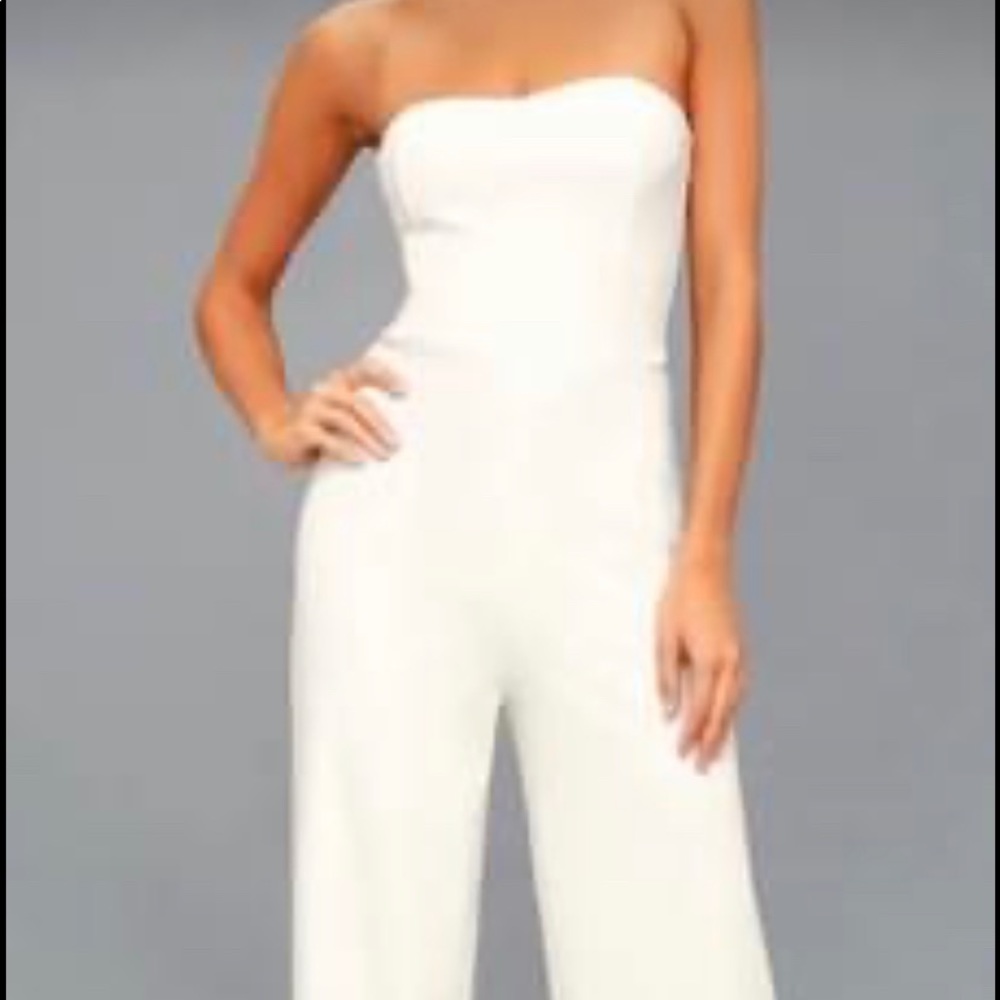 Brand new jumpsuit. Never worn, still has tags. Size XS